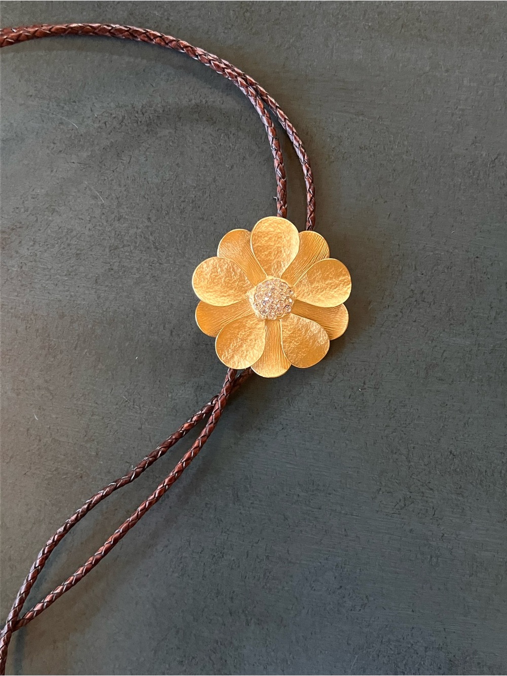 Textured Gold Flower Slide Necklace on Brown Braided Cord